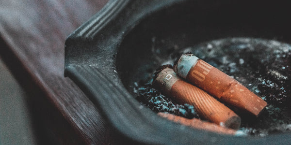 cigarette stubs in an ashtray smoking anxiety